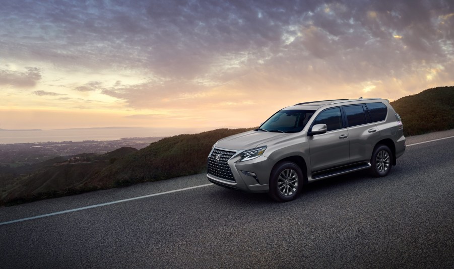 A silver 2022 Lexus GX SUV on a hill road