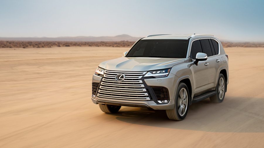 A silver 2022 Lexus LX 600 Ultra Luxury driving through the desert