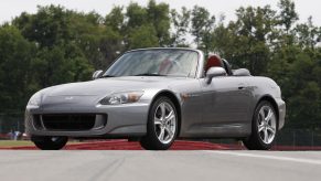 A gray 2009 Honda S2000 on a racetrack