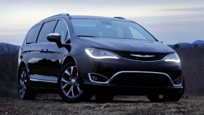 A black Chrysler Pacifica minivan.