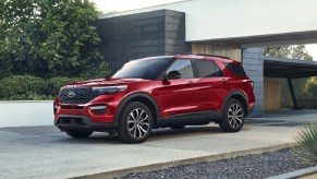 A red 2022 Ford Explorer parked in a driveway.