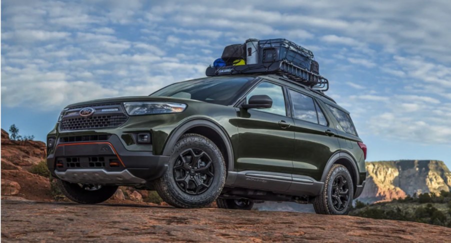 A black 2022 Ford Expedition Timberline full-size SUV is parked off-road.