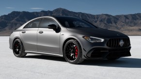 Fully loaded new Mountain Grey Mango 2022 Mercedes-Benz AMG CLA 45 Coupe with mountains in the background