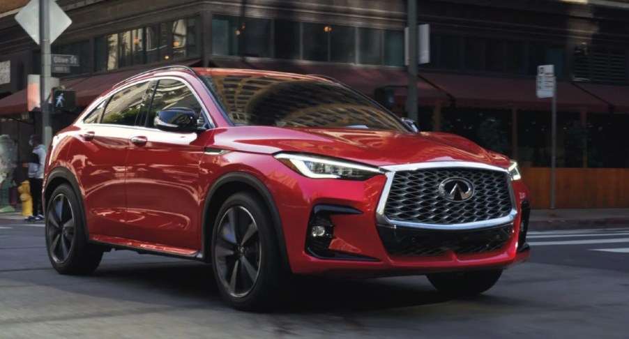 A red 2022 Infiniti QX55 is parked.