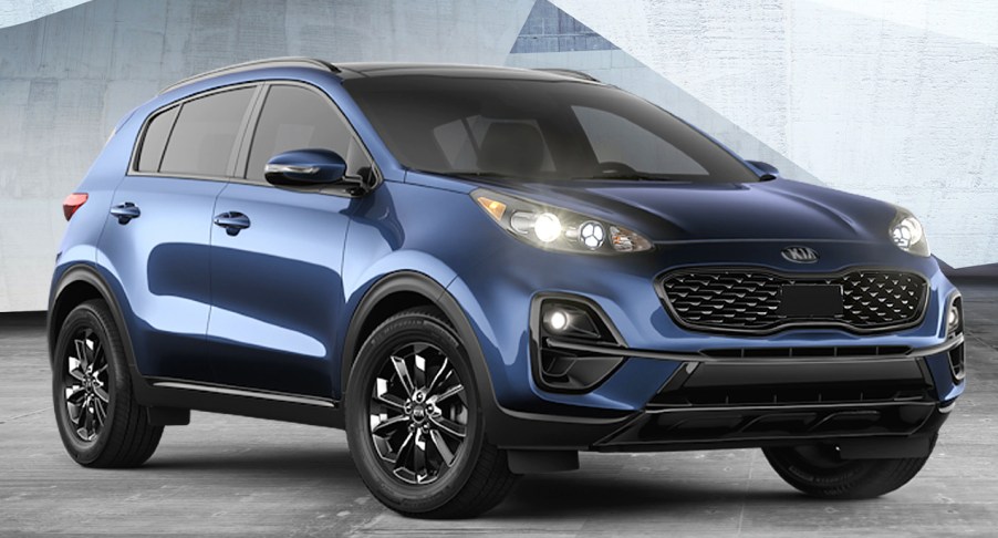 A blue 2022 Kia Sportage is parked.