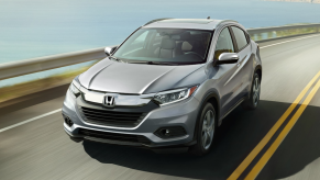 Lunar Silver Metallic 2022 Honda HR-V driving on a coastal road