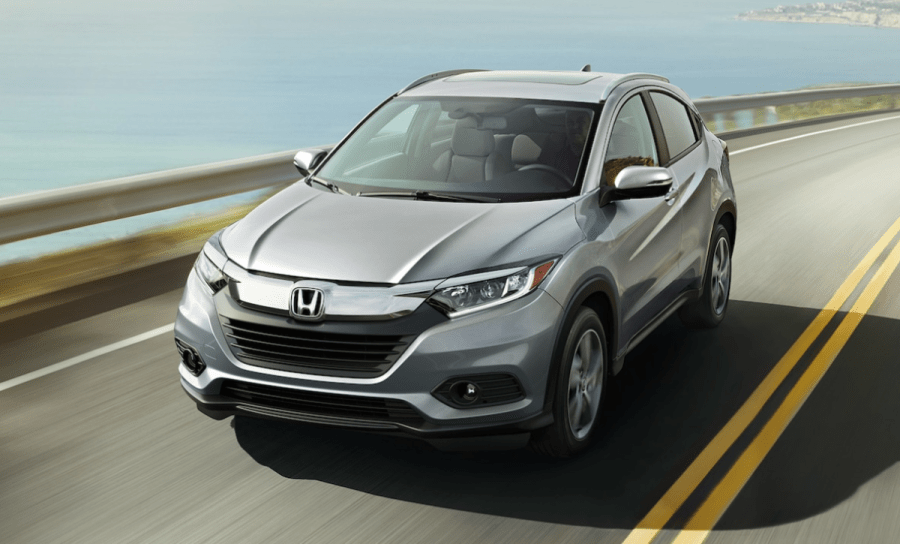 Lunar Silver Metallic 2022 Honda HR-V driving on a coastal road