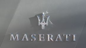 The Maserati logo and lettering of the Italian automotive manufacturer seen at the Shanghai Pudong International Airport