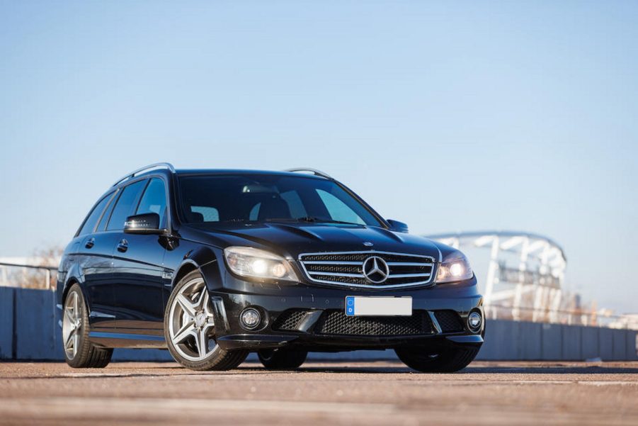 Michael Schumacher's black former 2010 Mercedes C63 AMG Estate in a parking lot