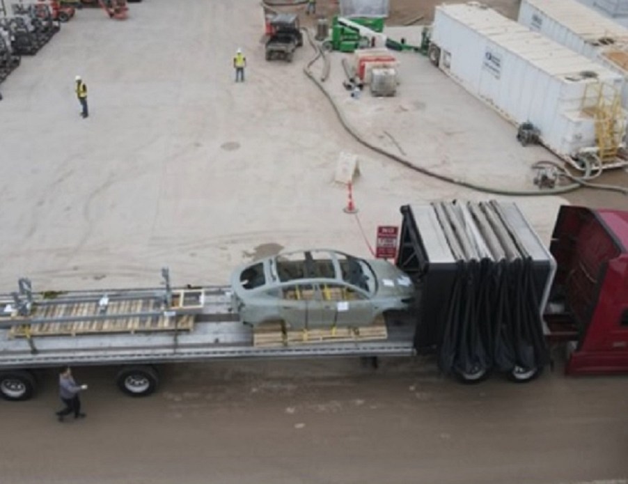 The gray structural battery pack of a Tesla Model Y