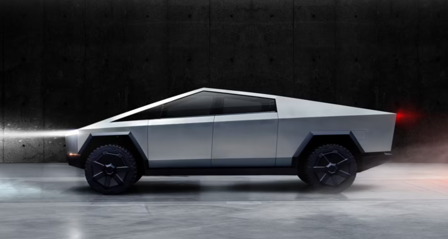 A Tesla Cybertruck against a black background.