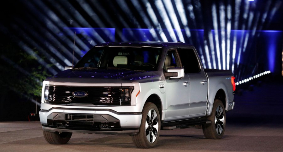 A gray Ford F-150 Lightning is on display.