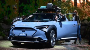 A blue 2023 Subaru Solterra is on display.