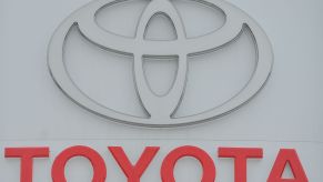 A Toyota logo with Toyota written in red underneath.