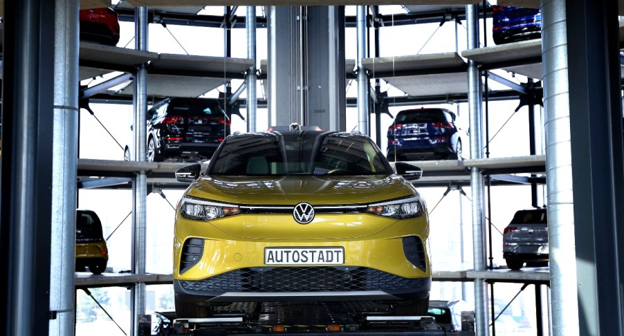 A yellow Volkswagen ID.4 SUV electric automobile is on display at the storage facility auto tower of German carmaker Volkswagen.