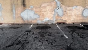 car oil leaks on the ground