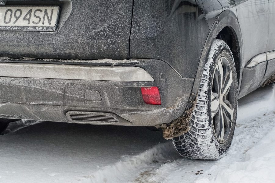 Car driving through road salt