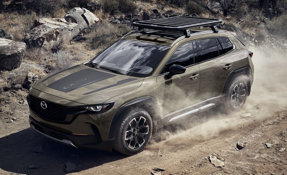 The 2023 Mazda CX-50 on a dirt road