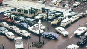 An overhead aerial shot of a crowded Chevron gas station in the morning in Portland, Orgeon