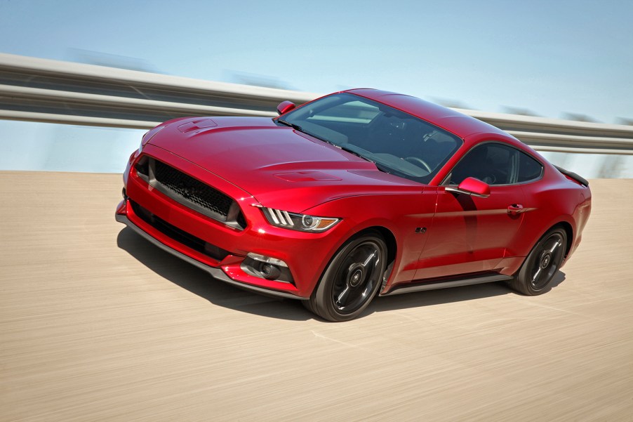 2016 Ford Mustang GT Equipped with the Black Accent Package driving on banked high speed course