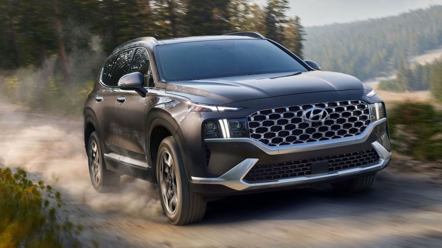 2021 Hyundai Santa Fe Hybrid tearing up a dirt road