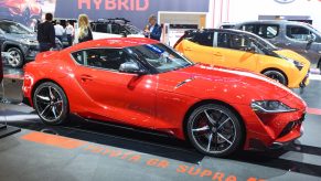 2021 Toyota Supra in red at a car show