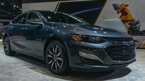 A dark-blue 2022 Chevrolet Malibu RS at the 2022 Chicago Auto Show