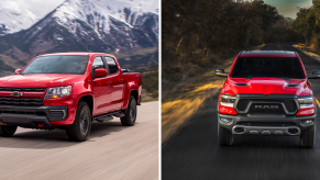 2022 Chevy Silverado 1500 Trail Boss and 2022 Ram 1500 Rebel full-size off-road pickup truck models in red paint colors