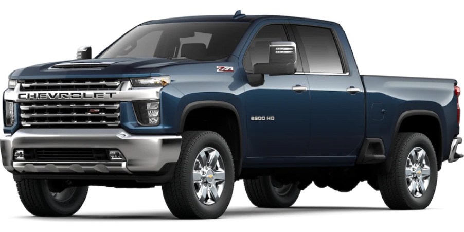 A dark blue 2022 Chevy Silverado 2500HD against a white background.