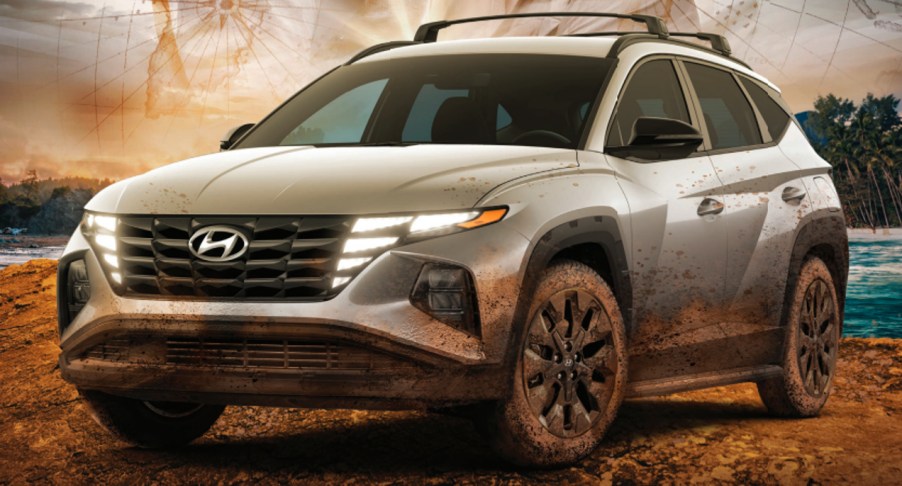 A gray 2022 Hyundai Tucson XRT on an 'Uncharted' movie poster.