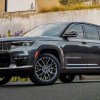 A gray 2022 Jeep Grand Cherokee is parked.