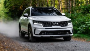 White 2022 Kia Sorento PHEV on a dirt trail