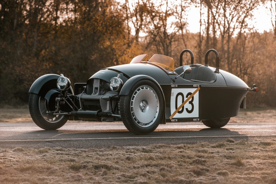 A dark-green 2022 Morgan Super 3 on a winter road