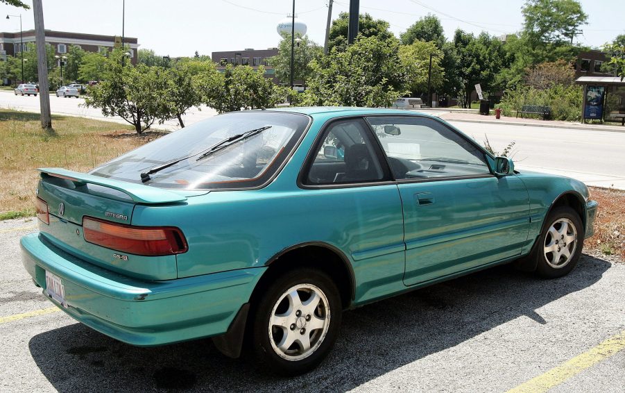 A 1993 Acura integra in aztec green pearl