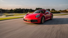 2022 Porsche 911 Guards Red driven on track at the Porsche Experience Center in Atlanta, Georgia