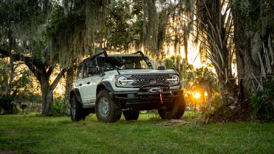 Desert Sand 2022 Ford Bronco Everglades with the sunset in the background