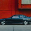 A black BMW E36 M3 shot in profile