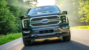 Front view of blue-gray 2022 Ford F-150, highlighting the cars Democrats and Republicans drive the most