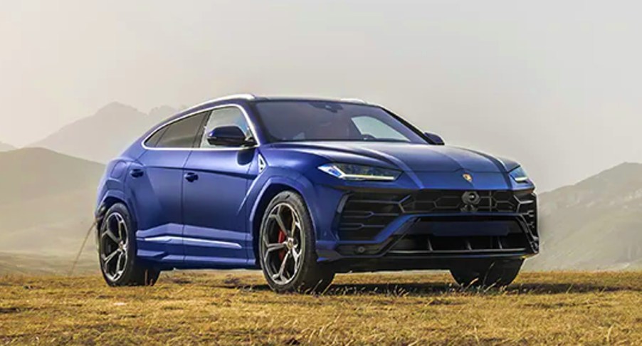 A blue 2022 Lamborghini Urus is parked.