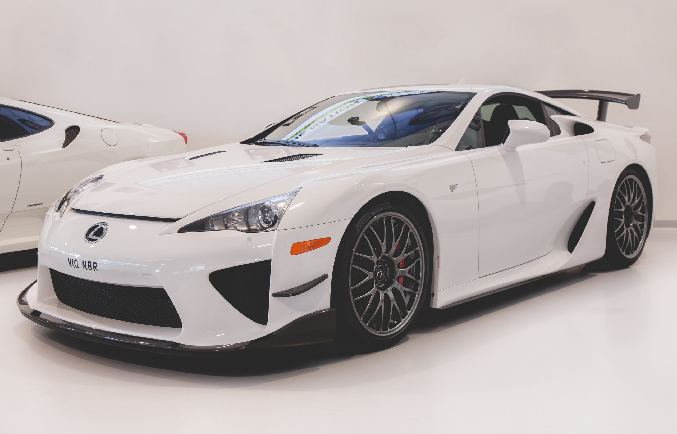 A white Lexus LFA super car shot from the front 3/4