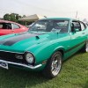 A mint green Ford Maverick