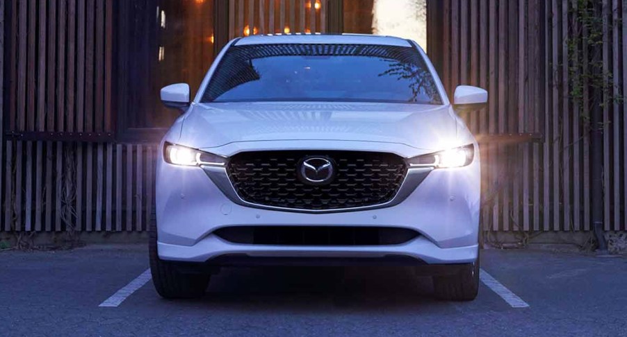 A white 2022 Mazda CX-5 compact SUV is parked.