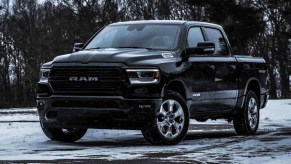 A black 2022 Ram 1500 full-size pickup truck is parked.