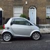 A non-electric version of the Smart ForTwo mini car parked in London, England