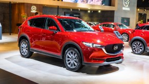 A red 2022 Mazda CX-5 is on display.