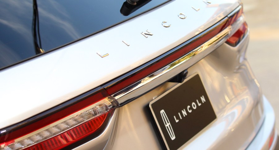 The rear of a white Lincoln Corsair.