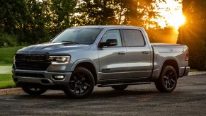 A gray 2022 Ram 1500 against a setting sun.