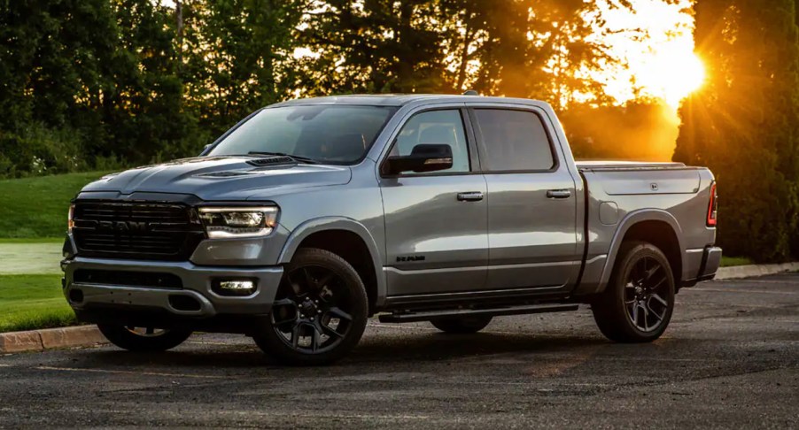 A gray 2022 Ram 1500 against a setting sun.