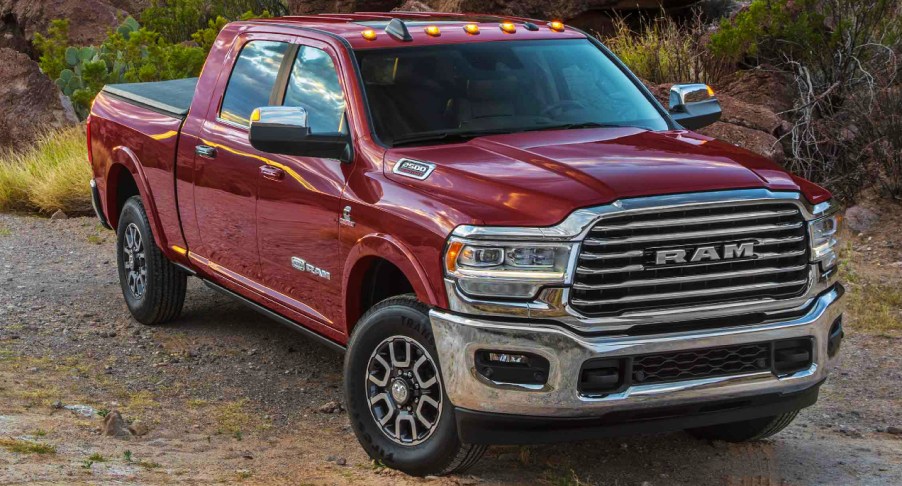 A red 2022 Ram 2500 is parked.