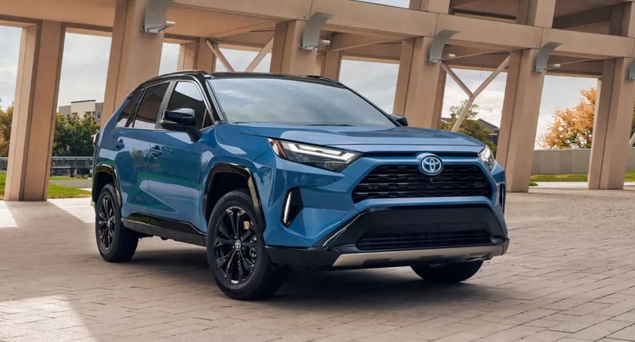 A blue 2022 Toyota RAV4 Hybrid XSE is parked.